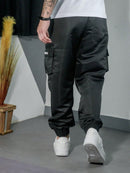 Vendedor IndicadoKit 2 Calça Jogger Bolsos Cargo Corta Vento Masculina Skate Preto/Caqui