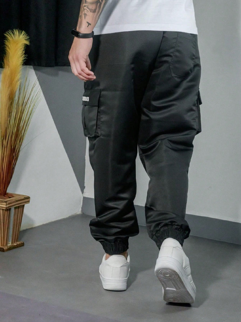 Vendedor IndicadoKit 2 Calça Jogger Bolsos Cargo Corta Vento Masculina Skate Preto/Caqui